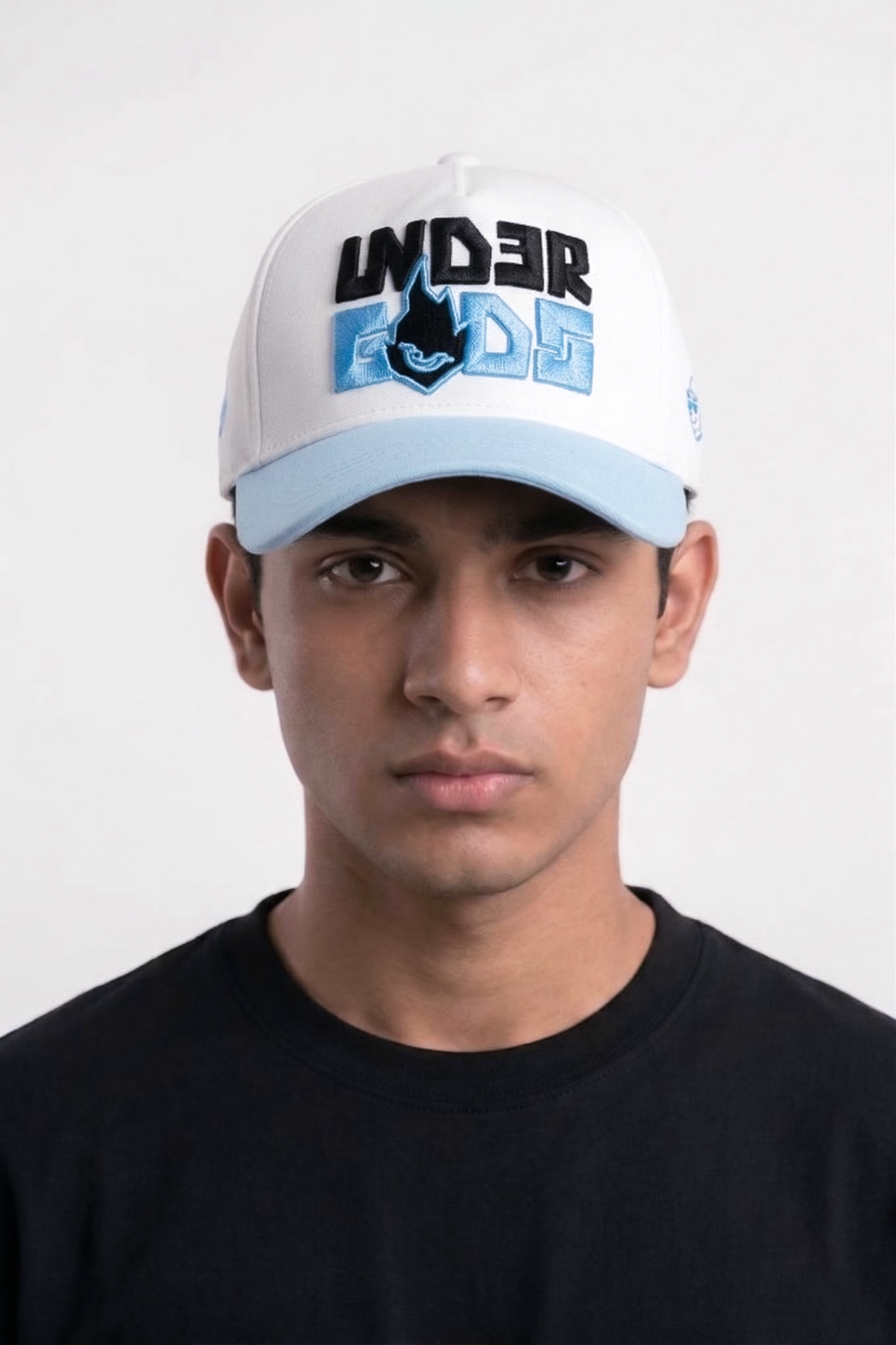 Man wearing Frost Flames white and blue embroidered baseball cap — best summer cap for men streetwear style