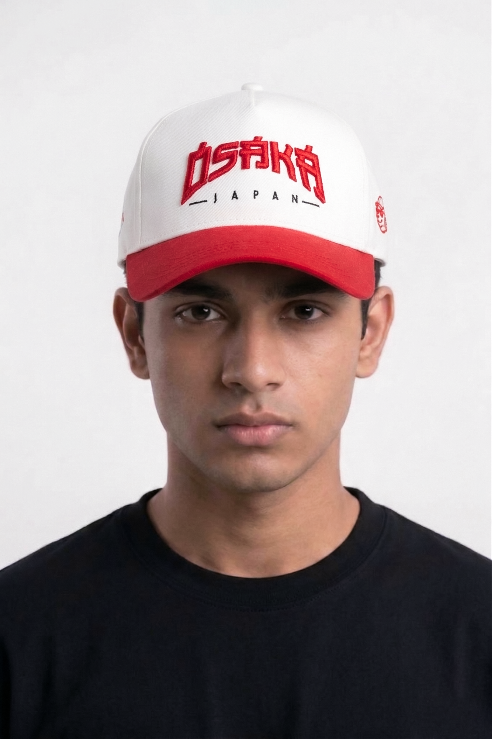 Man wearing Japan Street white and red Osaka embroidered baseball cap — best summer cap for men Japanese streetwear style India