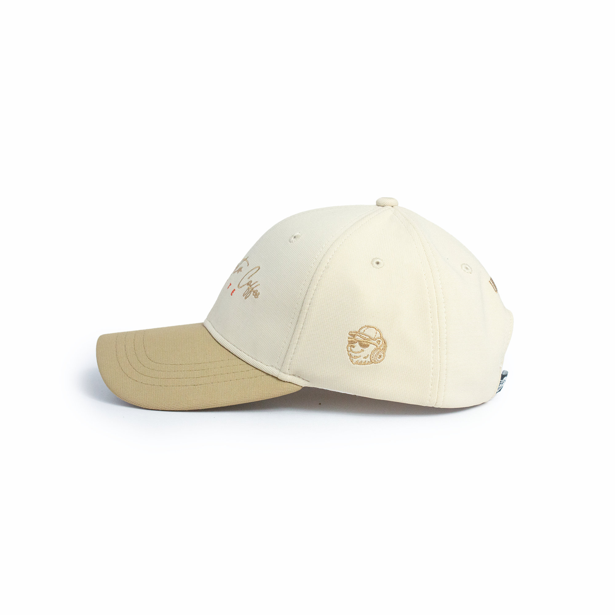 Side profile of beige and tan two-tone snapback baseball cap with warm latte curved brim and coffee cup side logo — summer cap for women