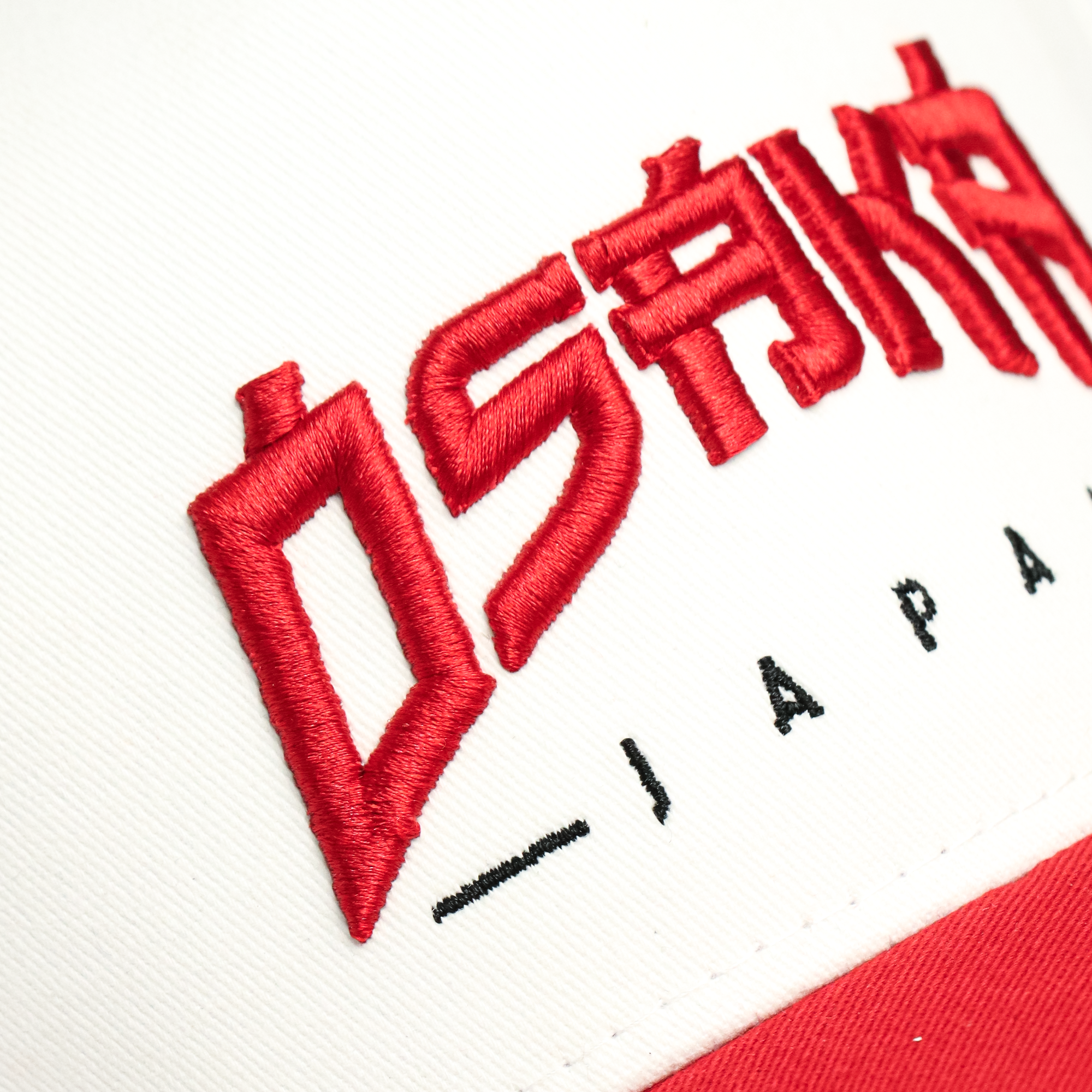 Back view of Japan Street white snapback cap showing adjustable closure — best white and red cap for men and women